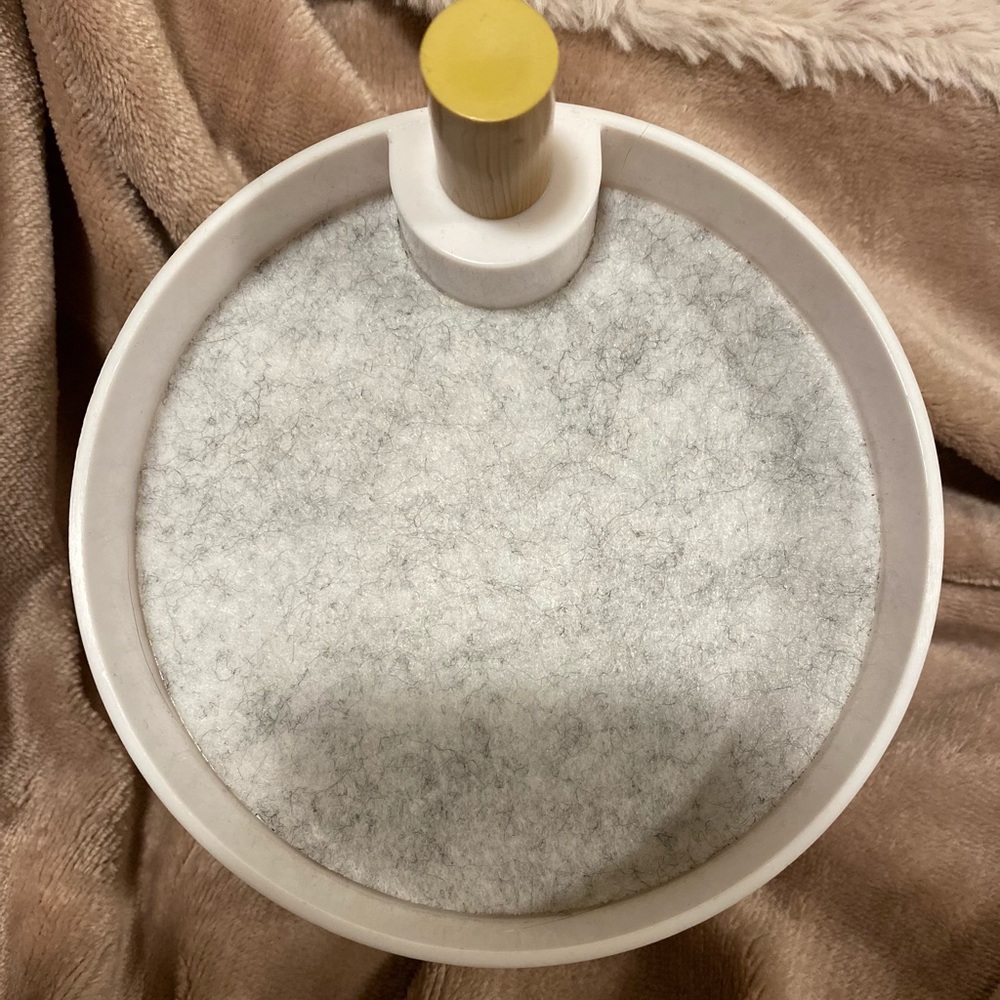 Brand new jewelry tri-circular jewelry holder with ring holder. Has 3 tiers.
